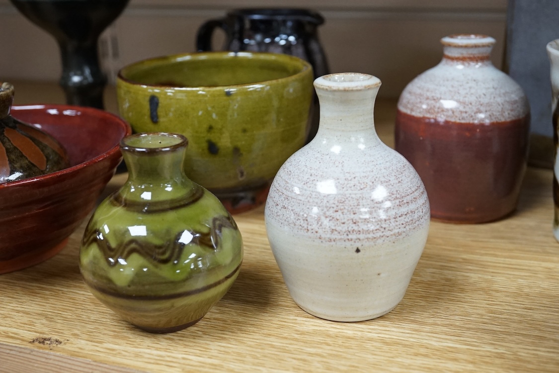 A collection of studio pottery to include a Celtic pottery Newlyn goblet, various jugs and bowls, largest 19cm high